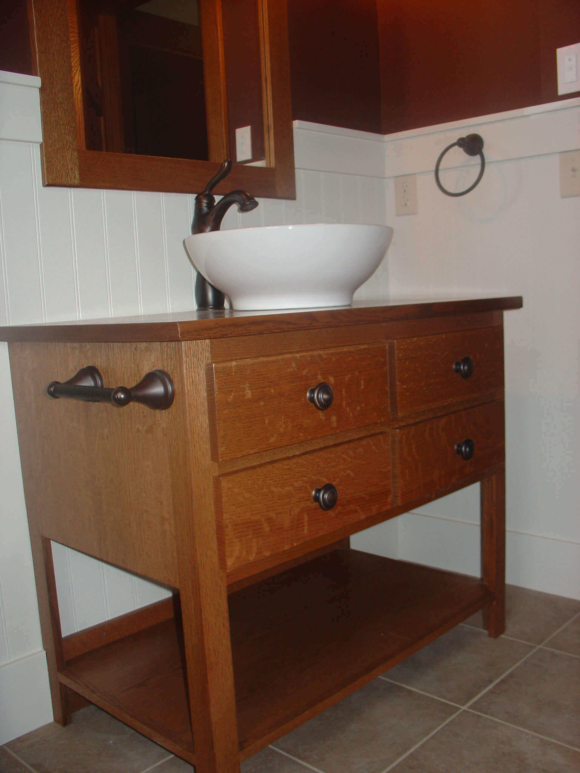 A wood dresser as a bathroom sink